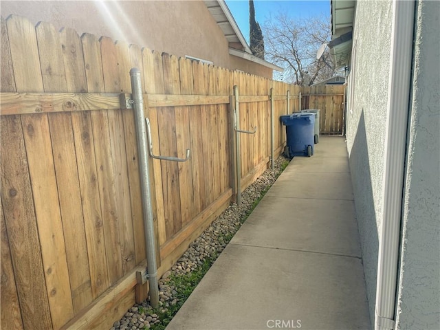 view of property exterior featuring fence