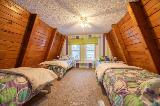 bedroom featuring vaulted ceiling, wood walls, carpet floors, and a textured ceiling