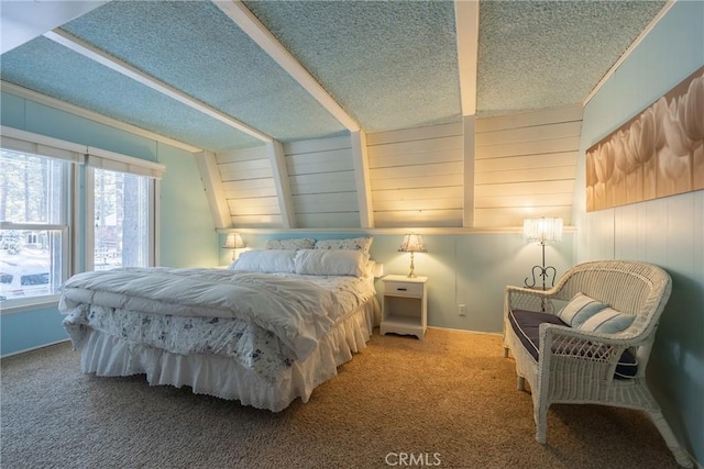 bedroom featuring carpet floors and a textured ceiling