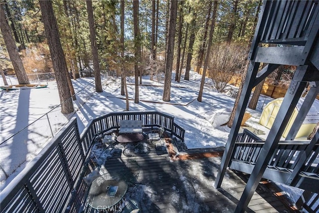 view of snow covered deck