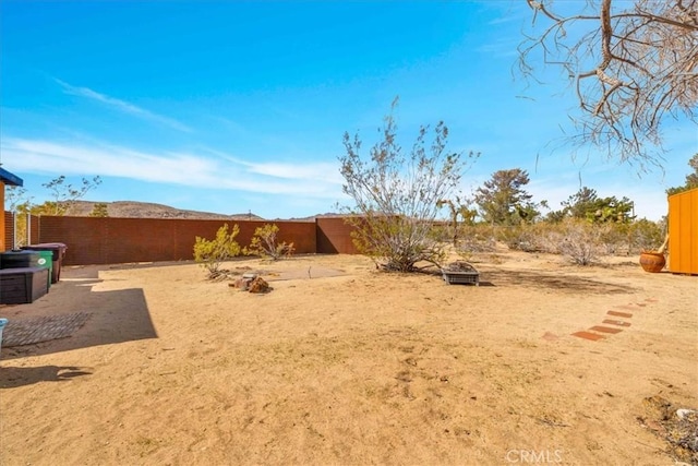 view of yard featuring a fenced backyard