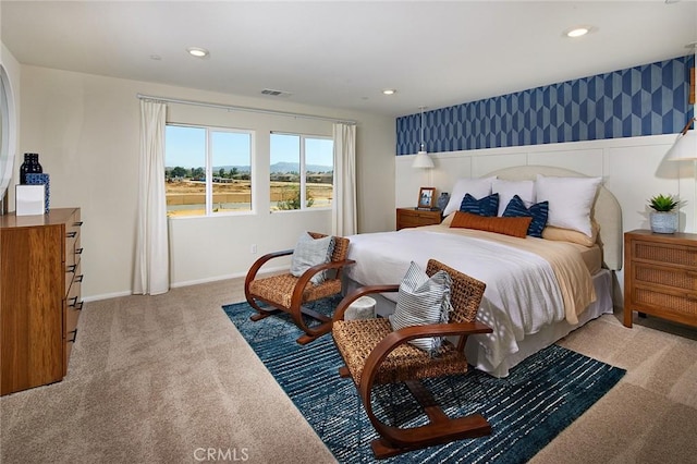 bedroom with recessed lighting, visible vents, baseboards, and light colored carpet