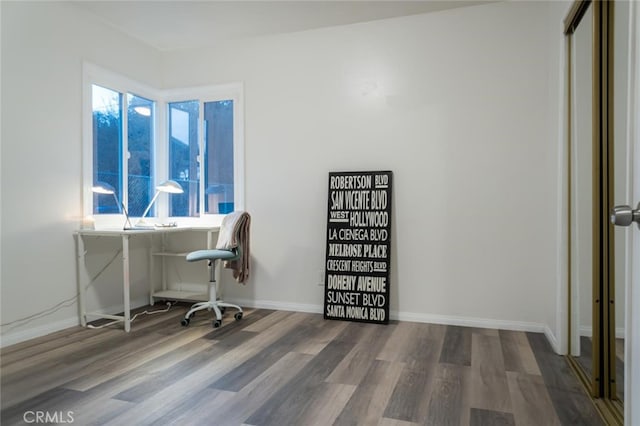 office with wood finished floors, a wealth of natural light, and baseboards