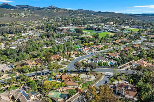 aerial view with a mountain view and a residential view