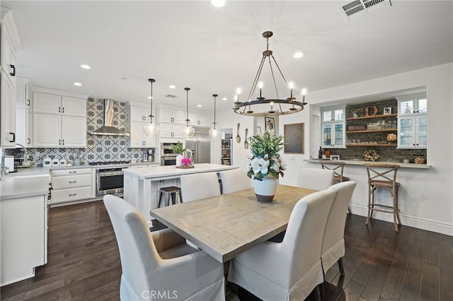 dining space featuring visible vents, recessed lighting, baseboards, and dark wood-style flooring