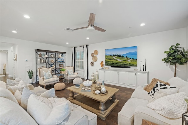 living area featuring visible vents, baseboards, ceiling fan, dark wood finished floors, and recessed lighting