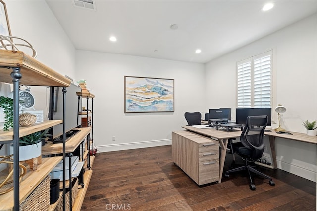 office area featuring dark wood finished floors, visible vents, recessed lighting, and baseboards