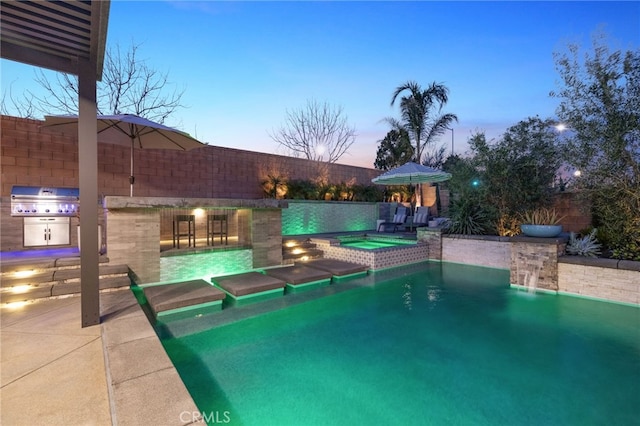 view of swimming pool with a patio area, grilling area, a fenced in pool, and an in ground hot tub