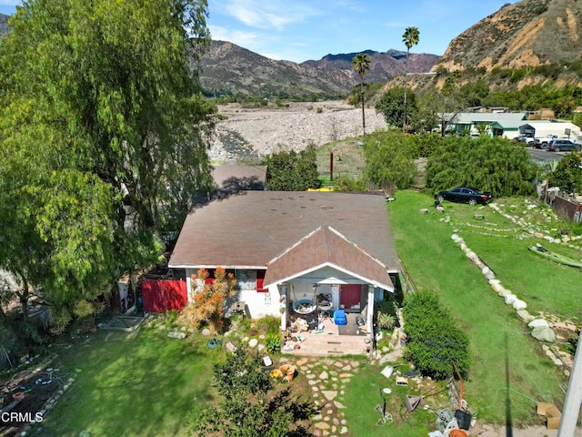 aerial view featuring a mountain view