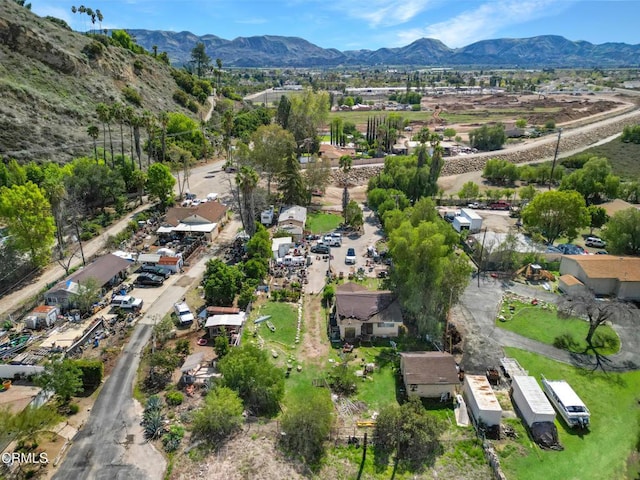 drone / aerial view featuring a mountain view