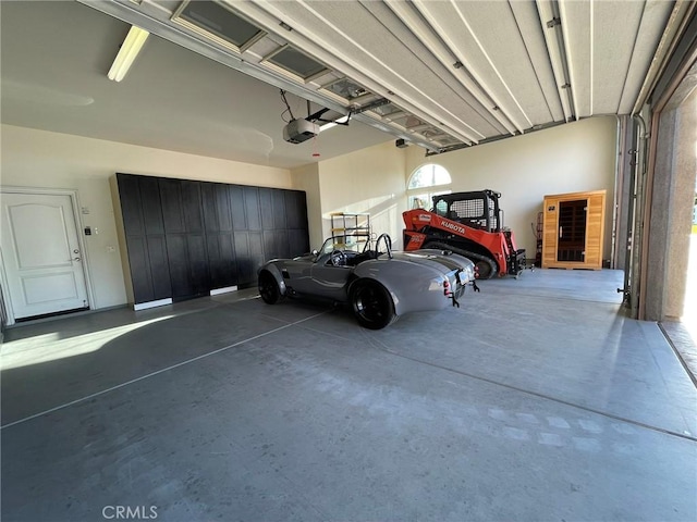 garage featuring a garage door opener