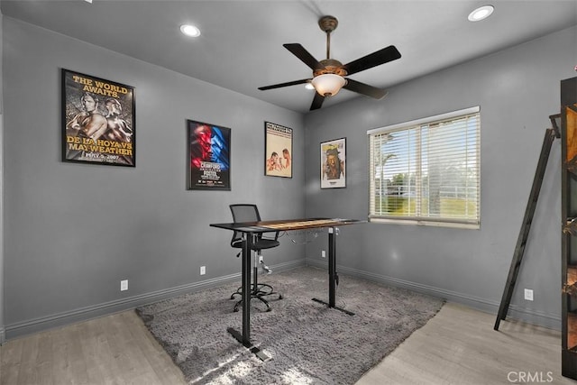 home office featuring recessed lighting, baseboards, wood finished floors, and a ceiling fan