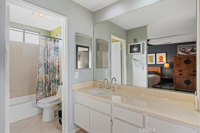 bathroom featuring vanity, shower / bath combo, tile patterned flooring, ensuite bathroom, and toilet