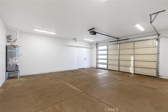 garage with a garage door opener and water heater