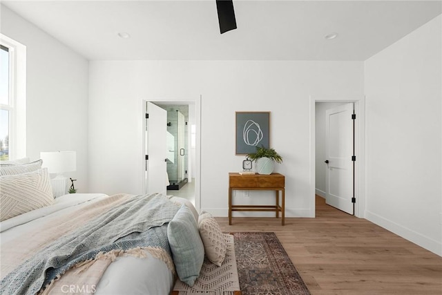 bedroom featuring light wood finished floors, ceiling fan, baseboards, and recessed lighting