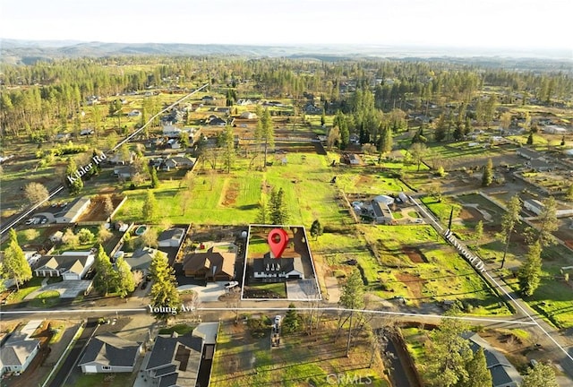 bird's eye view featuring a residential view and a view of trees