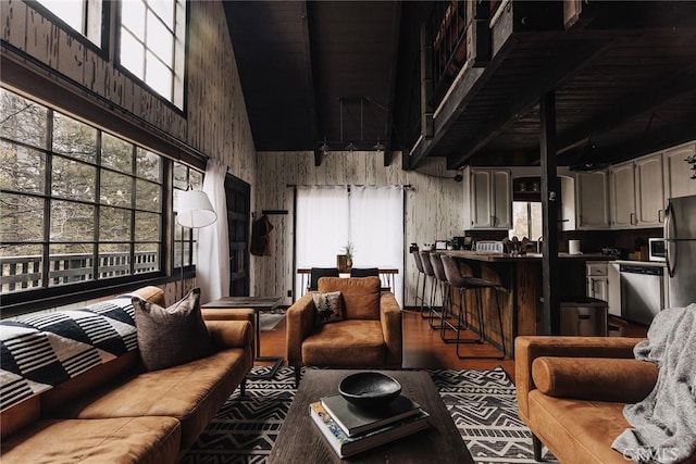 living area with a high ceiling