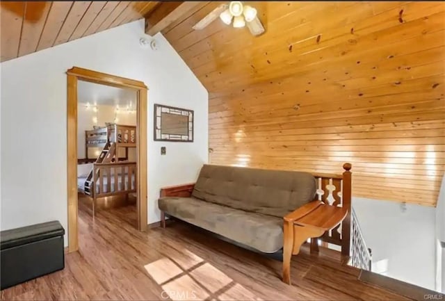 living area with a ceiling fan, wooden ceiling, vaulted ceiling with beams, an upstairs landing, and light wood-type flooring