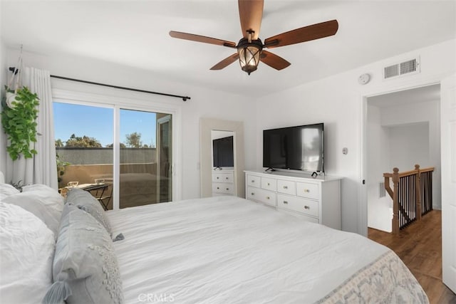 bedroom with dark wood finished floors, access to outside, visible vents, and ceiling fan