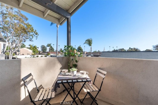 balcony featuring outdoor dining space