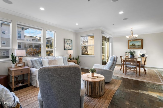 living room featuring ornamental molding, recessed lighting, baseboards, and an inviting chandelier