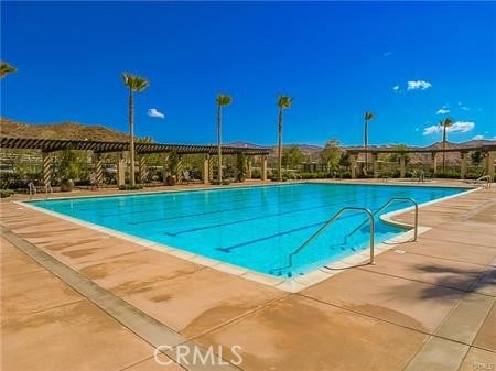 pool featuring a patio area