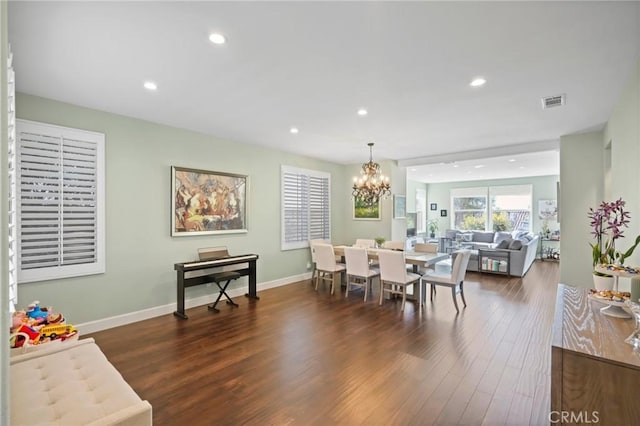 dining room with visible vents, baseboards, an inviting chandelier, recessed lighting, and dark wood-style flooring