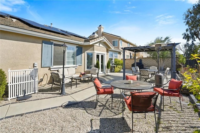 view of patio / terrace featuring outdoor lounge area, a fenced backyard, and a pergola