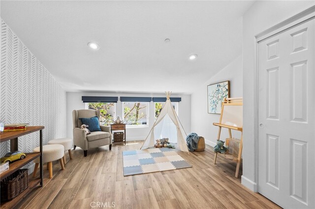 106 Via Sabinas, San Clemente, CA 92673 - living area featuring an accent wall, wallpapered walls, baseboards, light wood finished floors, and recessed lighting