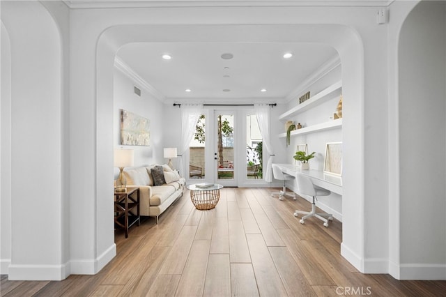 106 Via Sabinas, San Clemente, CA 92673 - living area with ornamental molding, wood finished floors, arched walkways, baseboards, and recessed lighting