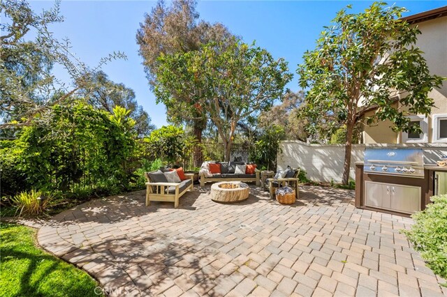 106 Via Sabinas, San Clemente, CA 92673 - view of patio / terrace featuring grilling area, an outdoor living space with a fire pit, and a fenced backyard