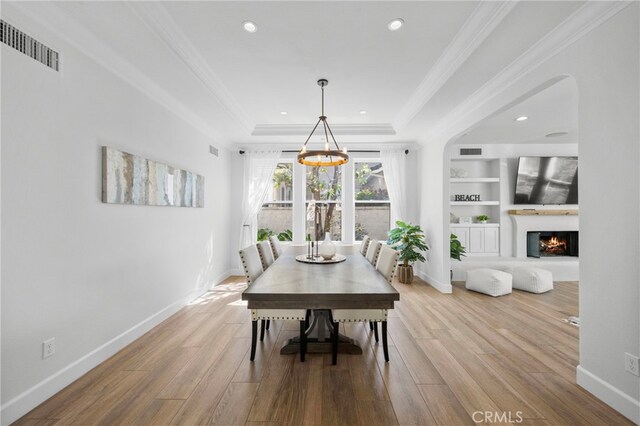 106 Via Sabinas, San Clemente, CA 92673 - dining space featuring a tray ceiling, a chandelier, wood finished floors, baseboards, and recessed lighting
