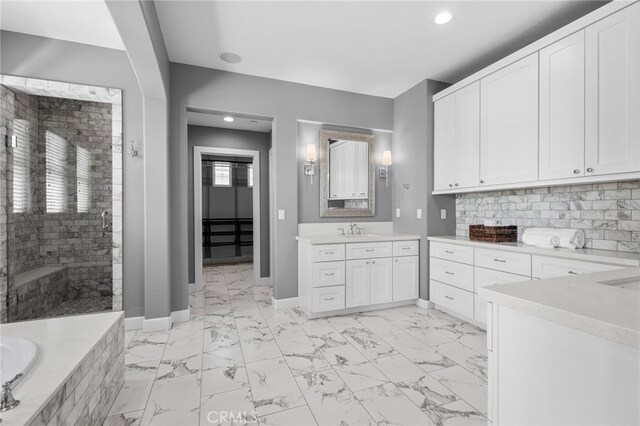 106 Via Sabinas, San Clemente, CA 92673 - full bath featuring marble look tiles, a stall shower, recessed lighting, baseboards, and backsplash