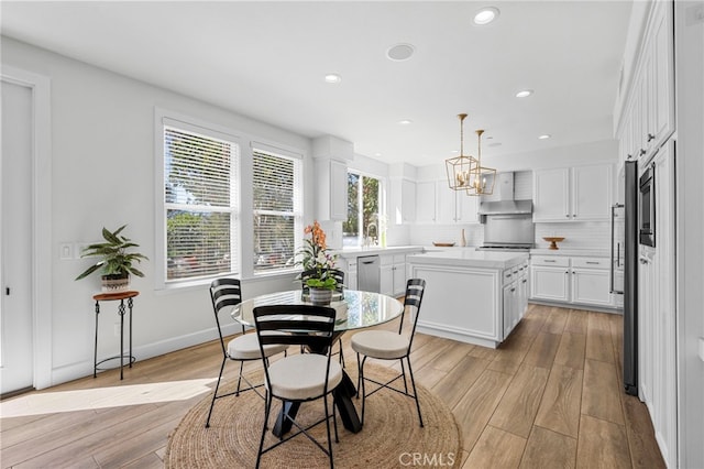 106 Via Sabinas, San Clemente, CA 92673 - dining space with light wood finished floors, recessed lighting, a chandelier, and baseboards