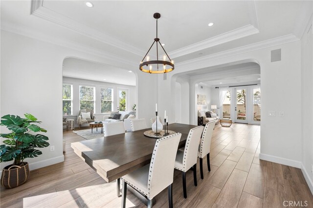 106 Via Sabinas, San Clemente, CA 92673 - dining room featuring arched walkways, plenty of natural light, wood finished floors, french doors, and recessed lighting