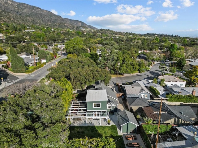 birds eye view of property with a residential view and a mountain view