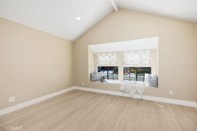 unfurnished living room featuring baseboards, lofted ceiling with beams, and light wood-style floors