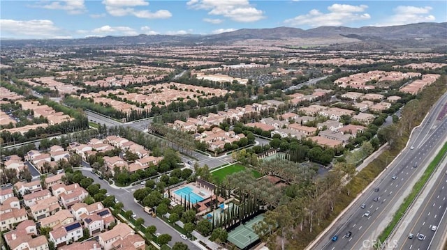 aerial view with a mountain view and a residential view