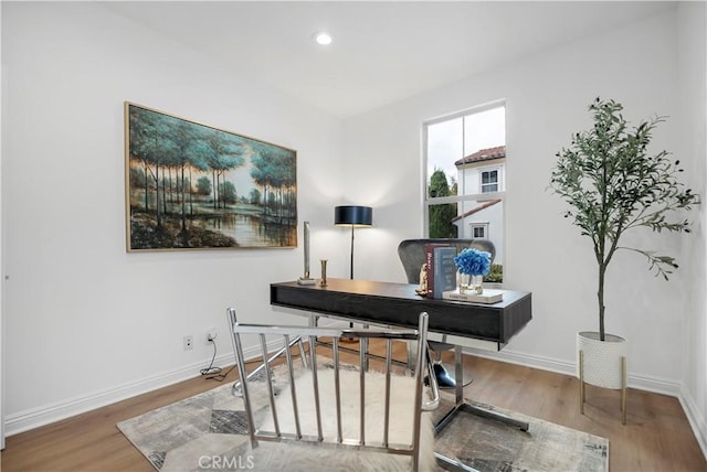 office area featuring recessed lighting, baseboards, and wood finished floors