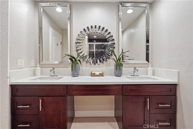 bathroom featuring double vanity and a sink