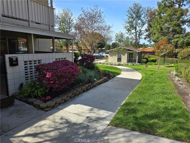 784 Via Los Altos Unit A, Laguna Woods, CA 92637 - view of yard with a balcony