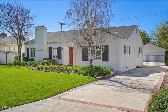 single story home featuring a chimney, an outdoor structure, a front lawn, a garage, and crawl space