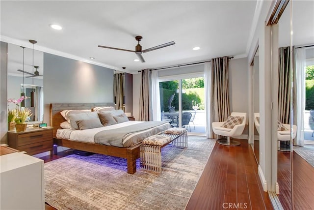 bedroom featuring access to outside, crown molding, wood finished floors, and recessed lighting