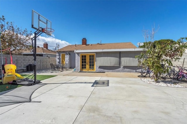 back of house featuring a patio, french doors, and fence