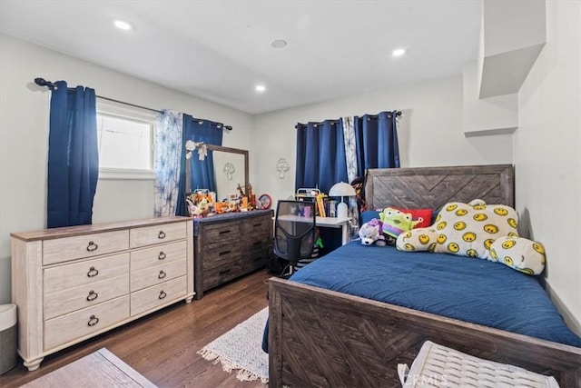 bedroom featuring dark wood-style flooring and recessed lighting