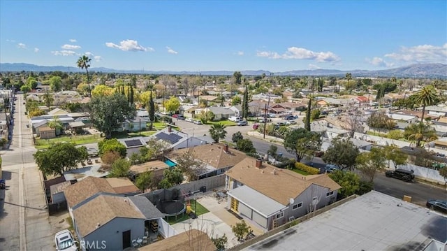 aerial view with a residential view and a mountain view