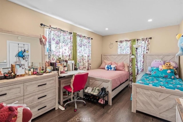 bedroom featuring dark wood-style floors, multiple windows, and recessed lighting