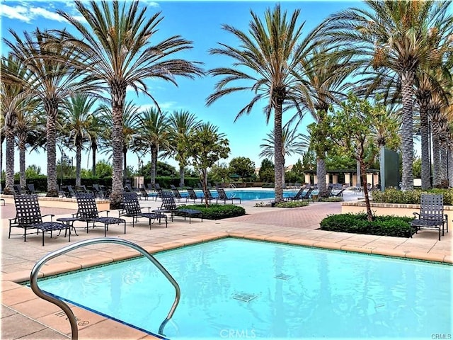 community pool featuring a patio