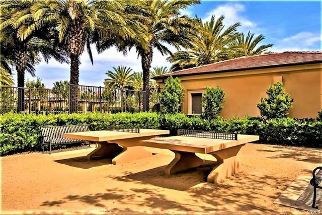 view of patio / terrace featuring fence