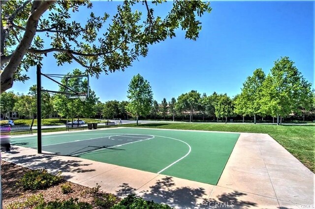 view of sport court with community basketball court and a yard